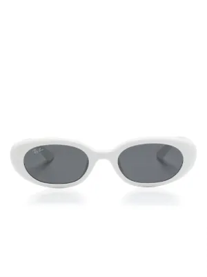 Miu Miu Eyewear Oval logo-detail Sunglasses | White | FARFETCH CA