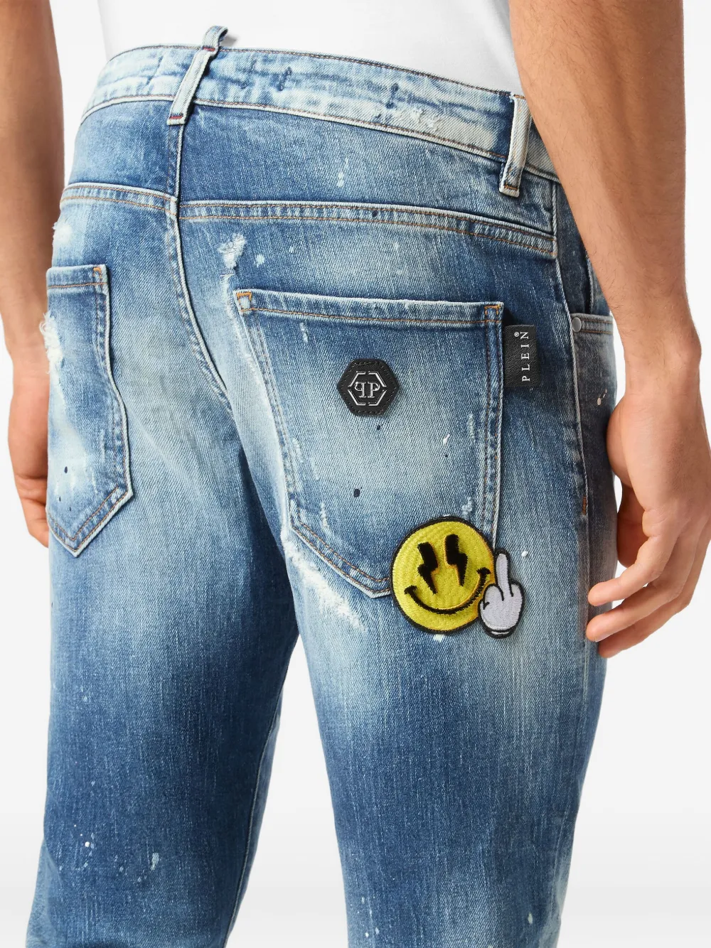 Philipp Plein paint-splatter distressed jeans Blauw