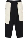 Black Comme Des Garçons panel-construction trousers