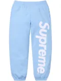 Supreme satin-appliqué cotton track pants - Blue