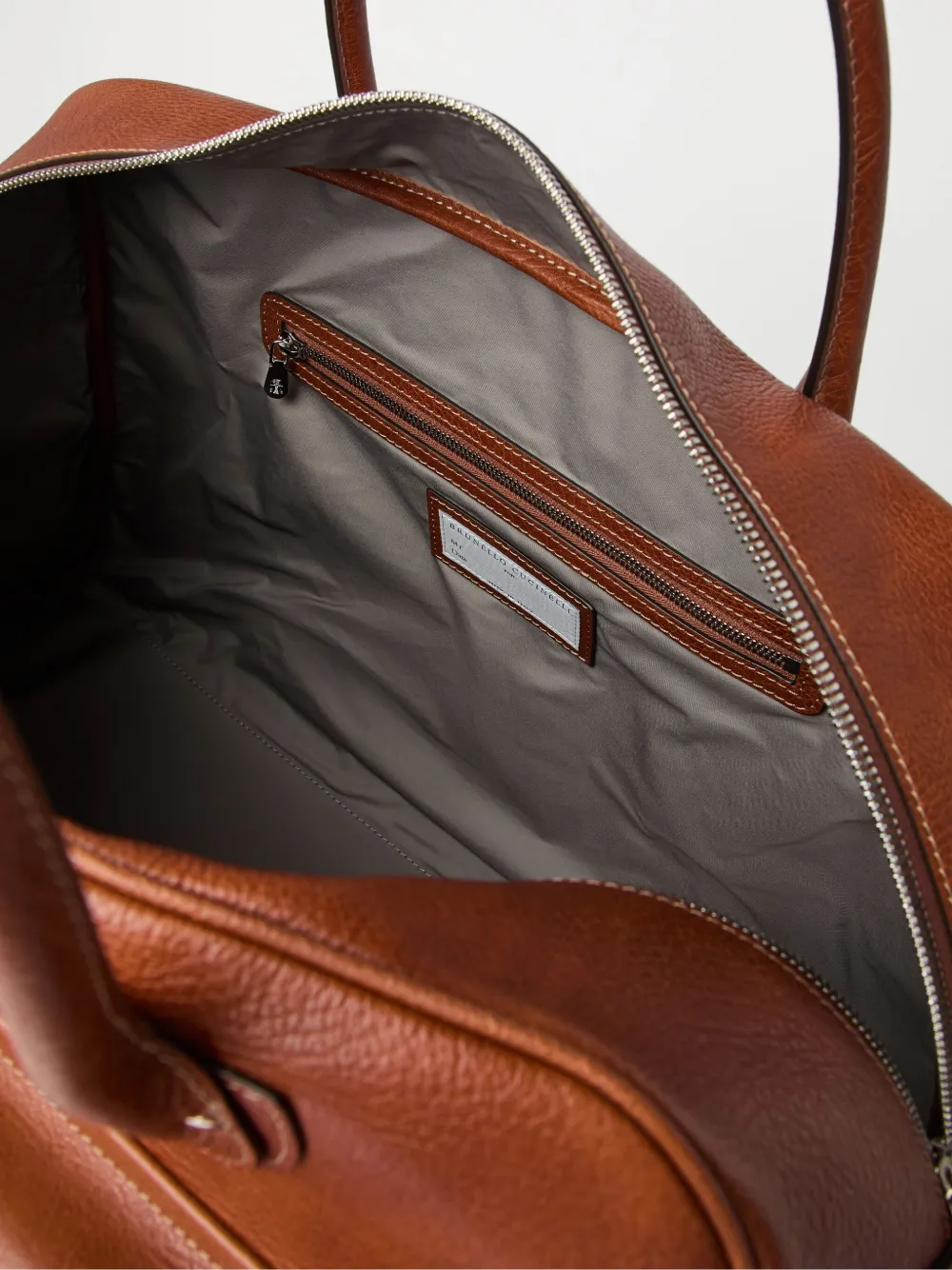 Brunello Cucinelli Leren weekendtas met logoprint Bruin