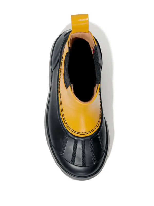 SOREL x Proenza Schouler Caribou Chelsea Boots | Yellow | FARFETCH CA