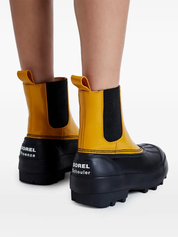 SOREL x Proenza Schouler Caribou Chelsea Boots | Yellow | FARFETCH CA