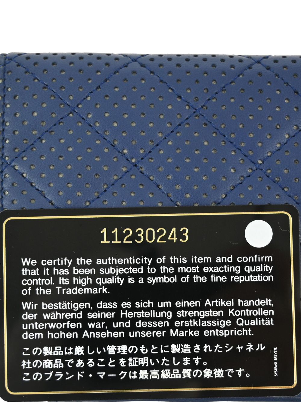 CHANEL 2007 perforated bi-fold wallet Women