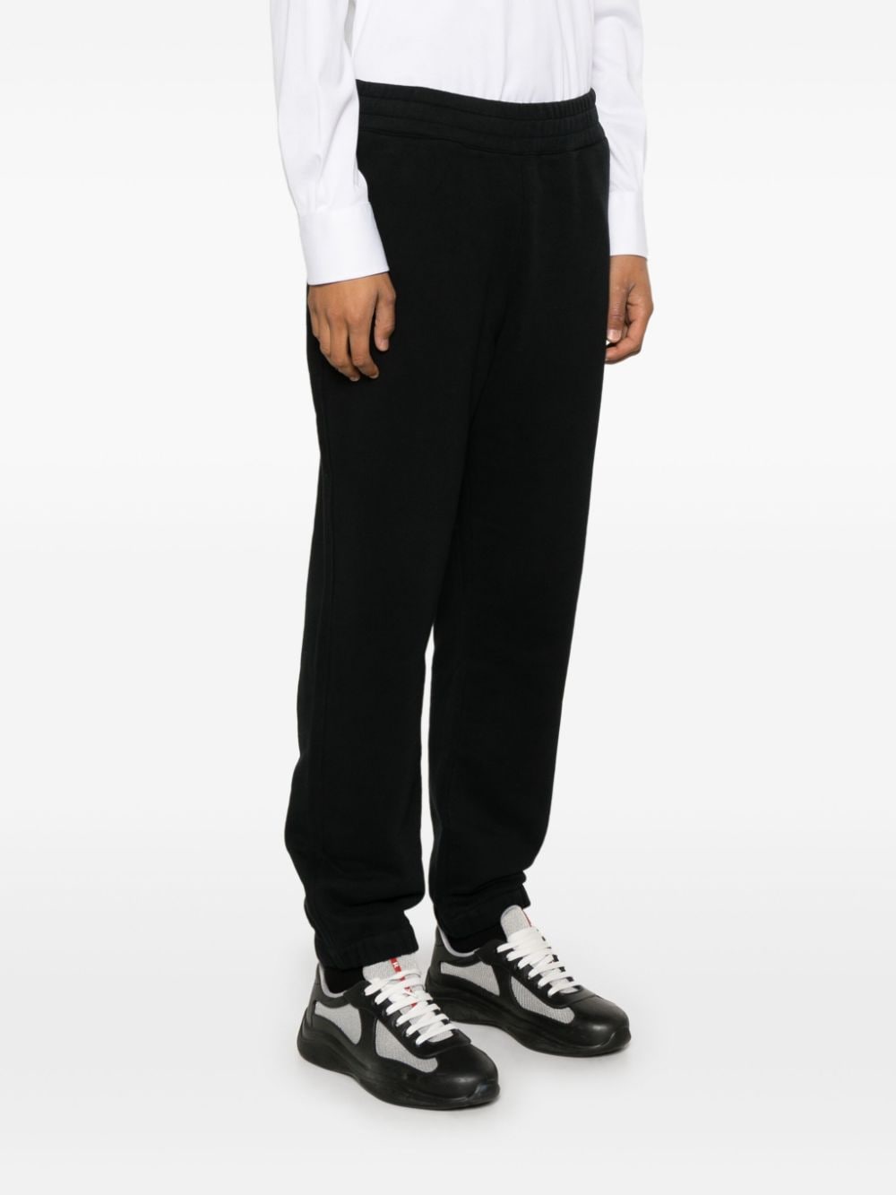 Shop Zegna Rubberised-logo Track Pants In Blue