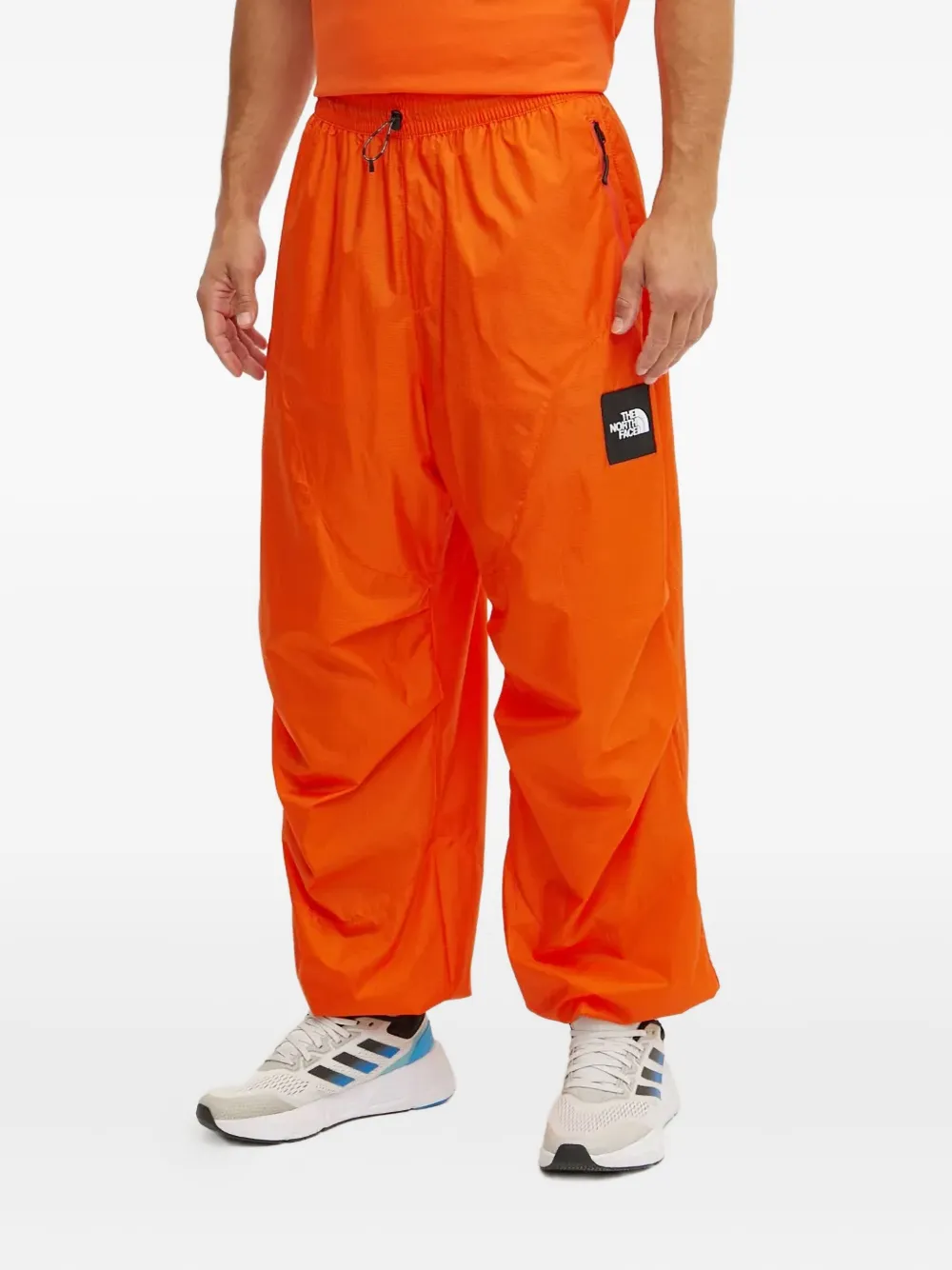 The North Face Xyinka Ilori Drawstring Zip-pocket Track Pants In Orange