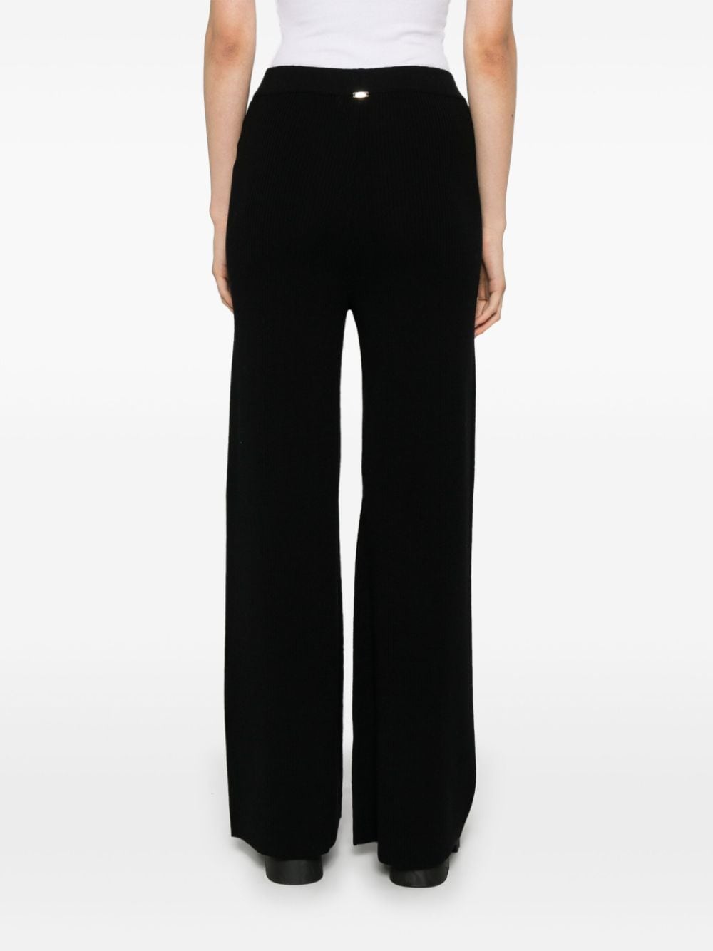 Shop Herno Flared Trousers In Black