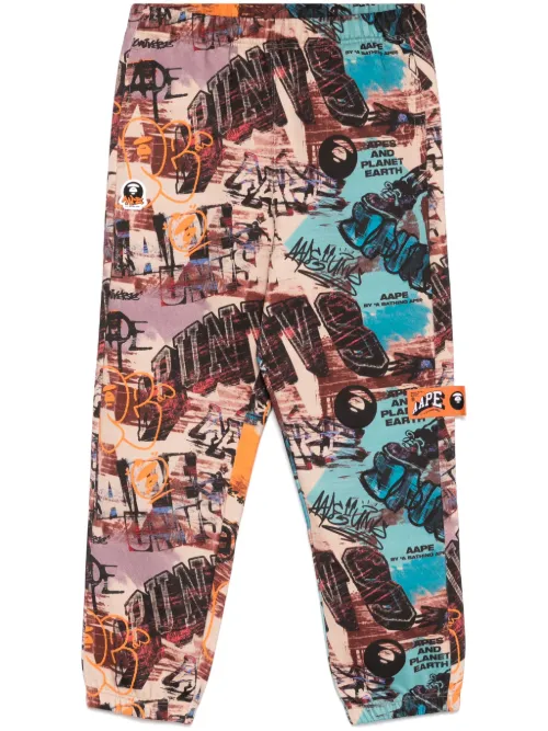 Pantalon de jogging à imprimé graffiti - AAPE BY *A BATHING APE® - Modalova