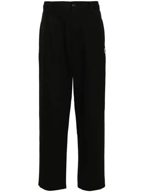 Pantalon chino à patch logo - A BATHING APE® - Modalova