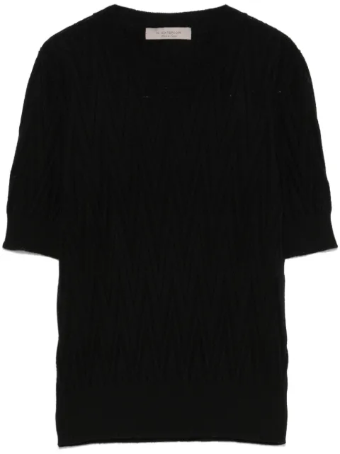 D.Exterior chevron-knit sweater