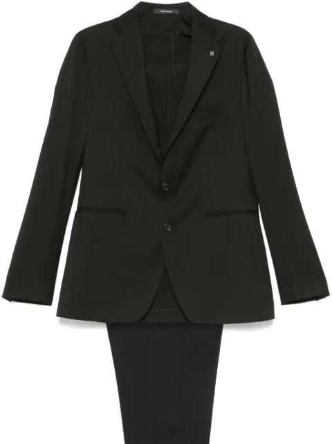 Tagliatore traje con botones