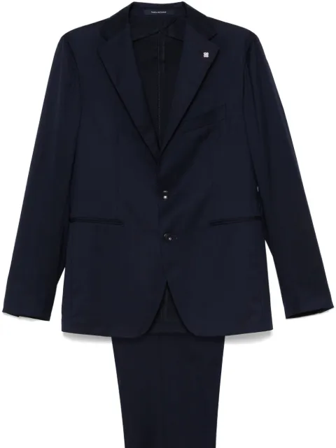Tagliatore traje con botones