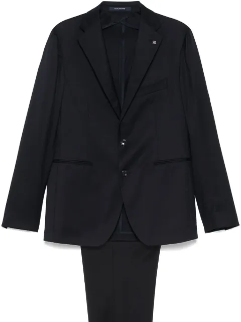 Tagliatore traje con botones