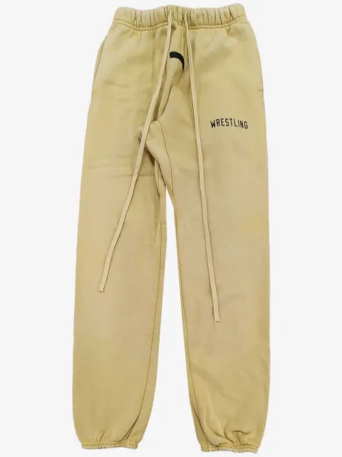 FEAR OF GOD ESSENTIALS slogan-print track pants