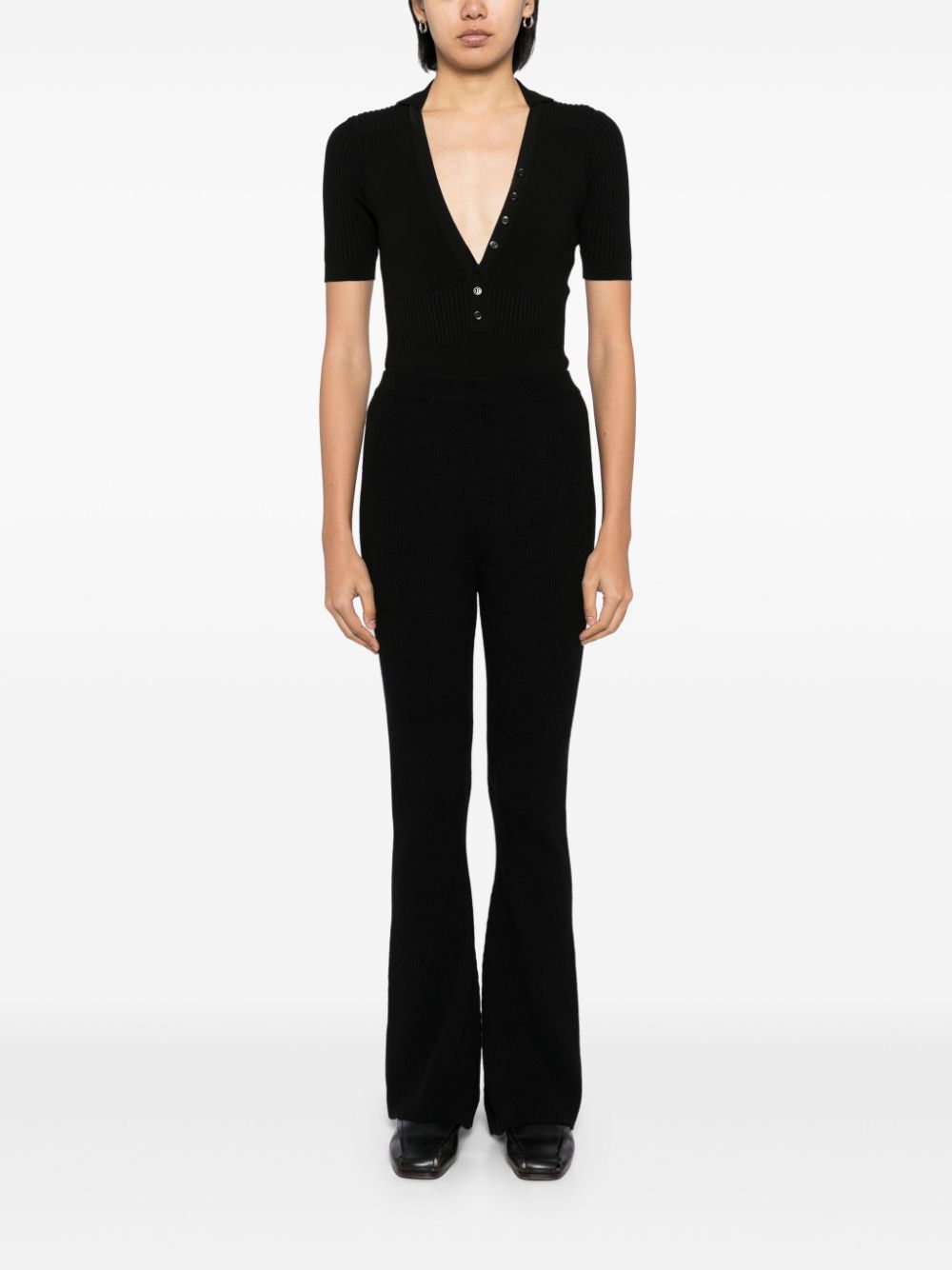 Shop Izaak Azanei Ribbed Flared Trousers In Black