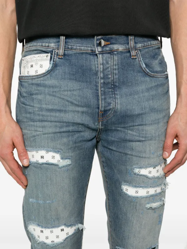 AMIRI Repaired Jeans | Blue | FARFETCH