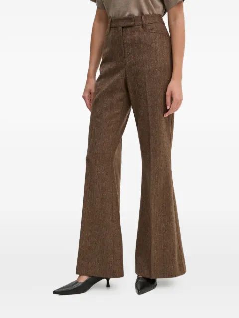 REMAIN pantalones acampanados