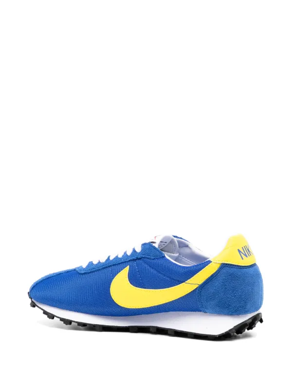 nike trainers blue with yellow tick