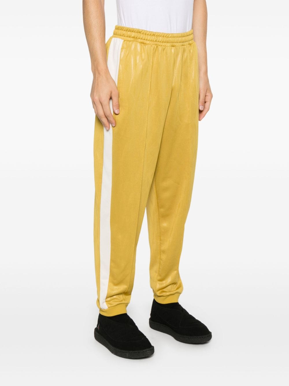 Shop Puma The Neverworn Iv T7 Track Pants In Yellow