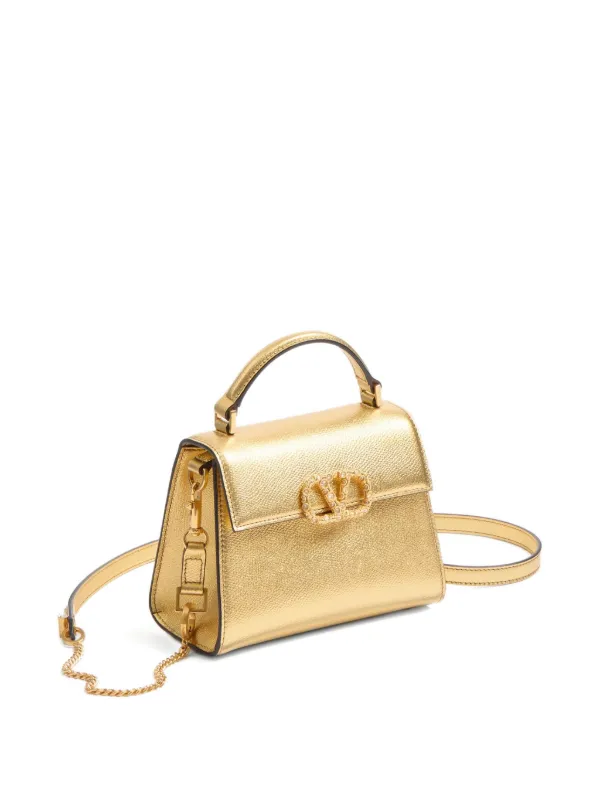 Valentino Garavani Vsling Mini Bag | Gold | FARFETCH Valentino Garavani Vsling Mini Bag | Gold | FARFETCH
