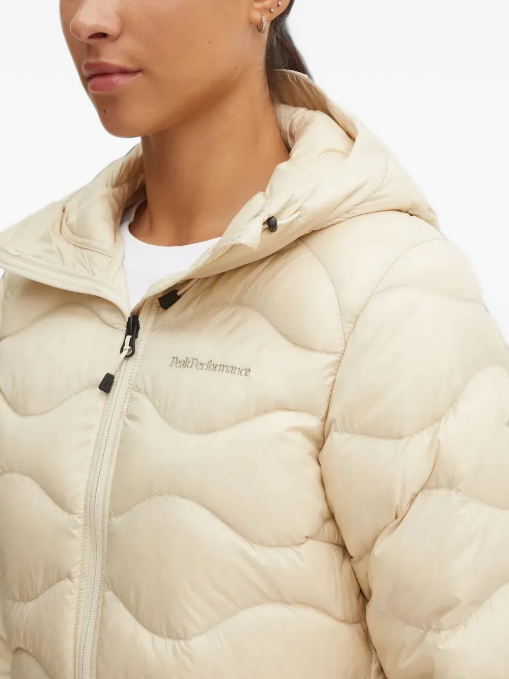 Peak Performance quilted hooded jacket Beige