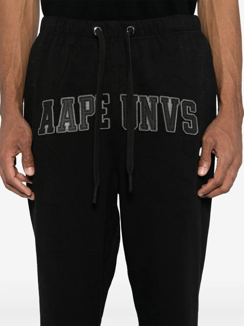AAPE BY *A BATHING APE Trainingsbroek met Moonface-logo Zwart