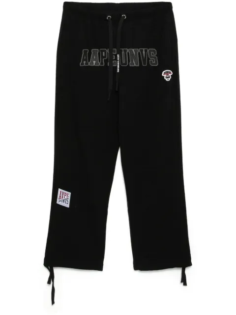 AAPE BY *A BATHING APE® pants con logo Moonface