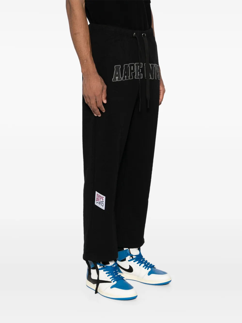 AAPE BY *A BATHING APE Trainingsbroek met Moonface-logo Zwart