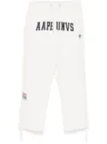 AAPE BY *A BATHING APE® debossed logo pants - Neutrals