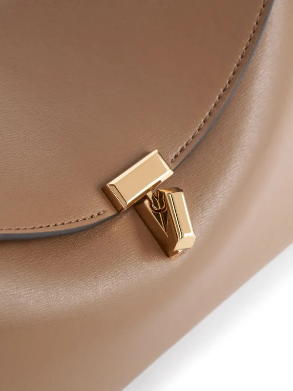 TOTEME T-lock Clutch Bag | Brown | FARFETCH