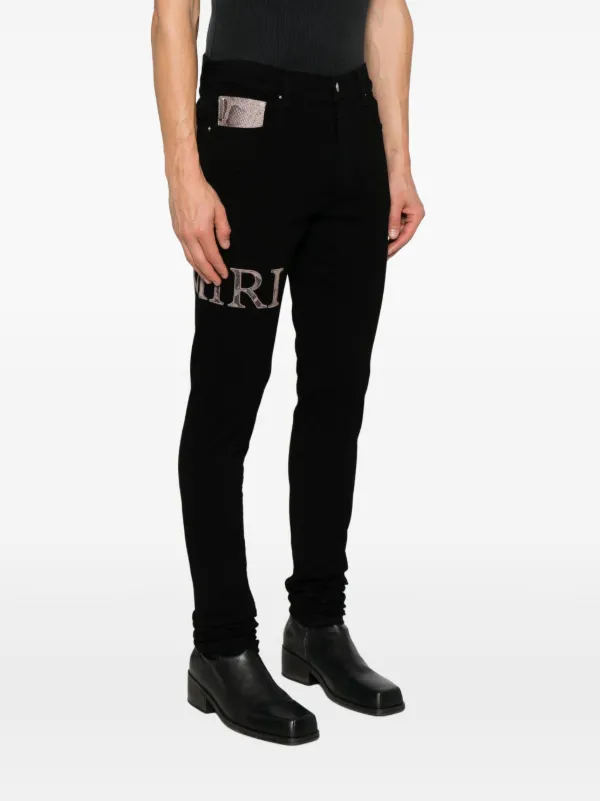 AMIRI ロゴ ジーンズ | ブラック | FARFETCH JP AMIRI ロゴ ジーンズ | ブラック | FARFETCH JP
