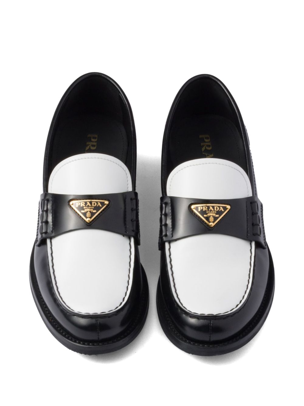 Prada Tweekleurige loafers van geborsteld leer Zwart