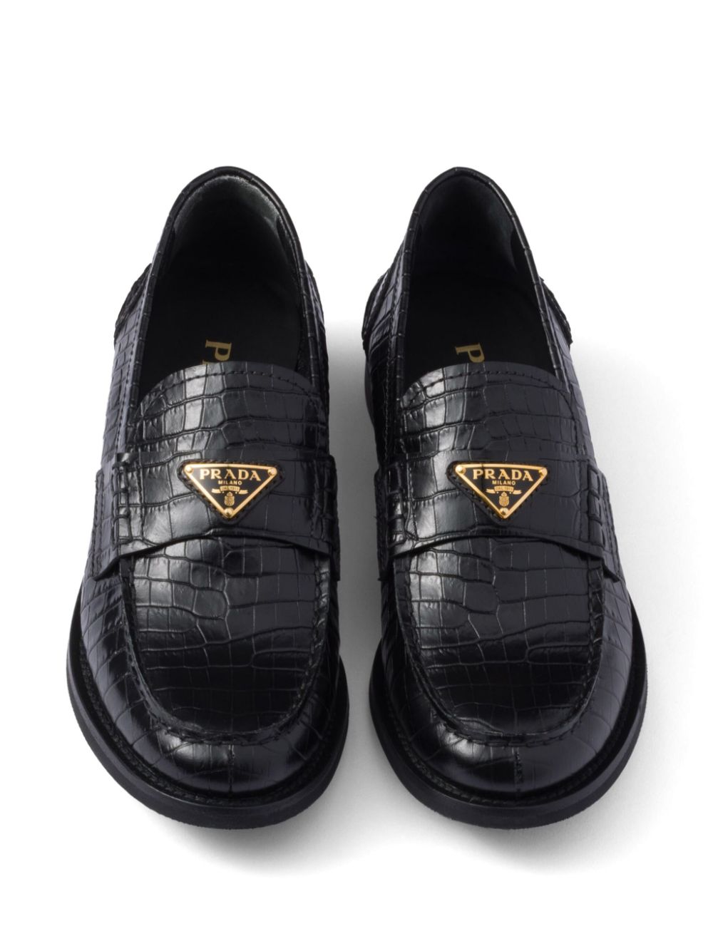 Prada Leren loafers met krokodillen-reliëf Zwart