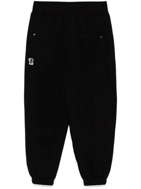 izzue logo-patch pants