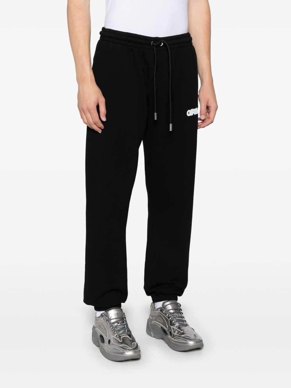 OFF-WHITE SPRAY ARROW TRACK PANTS 