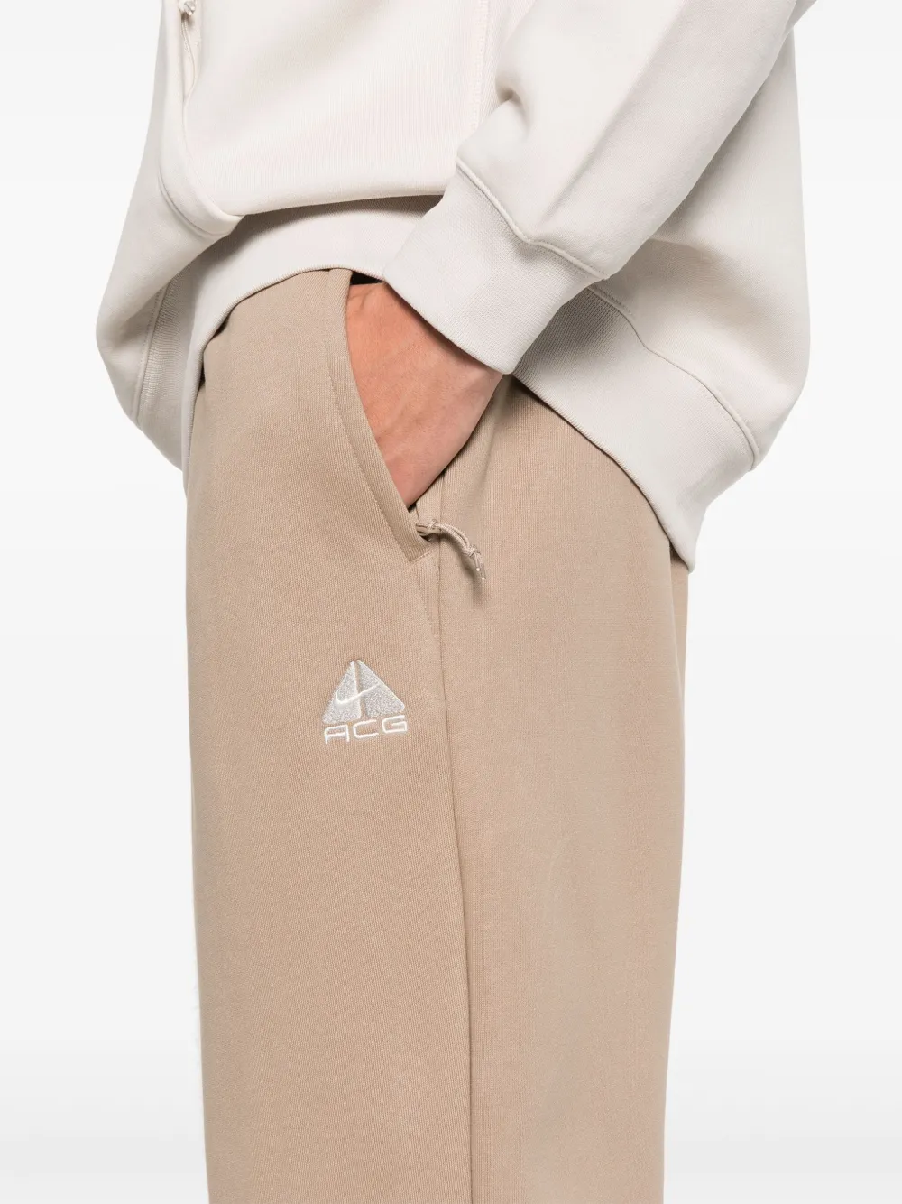 Nike Trainingsbroek met geborduurd logo Beige