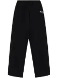 VETEMENTS logo-print cotton pants - Black