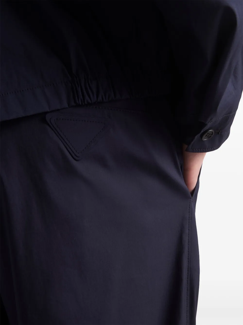 Prada Mid waist broek met toelopende pijpen Blauw