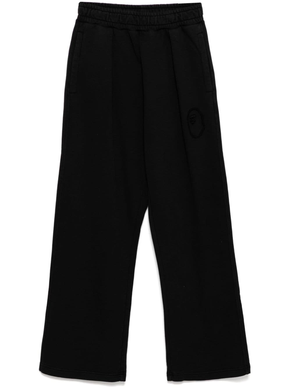 A BATHING APE® garment-dye track pants – Black