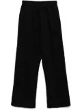 A BATHING APE® garment-dye track pants - Black