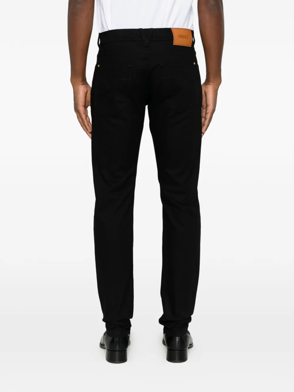 Versace Medusa '95 jeans met logo-plakkaat Zwart