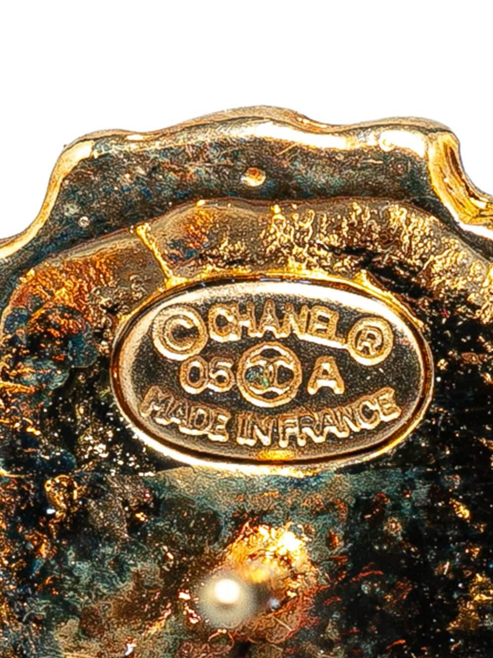 CHANEL Pre-Owned 2005 vergulde oorbellen met stras en leeuwenkop - Goud