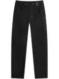 and Wander x Gramicci logo-print track pants - Black