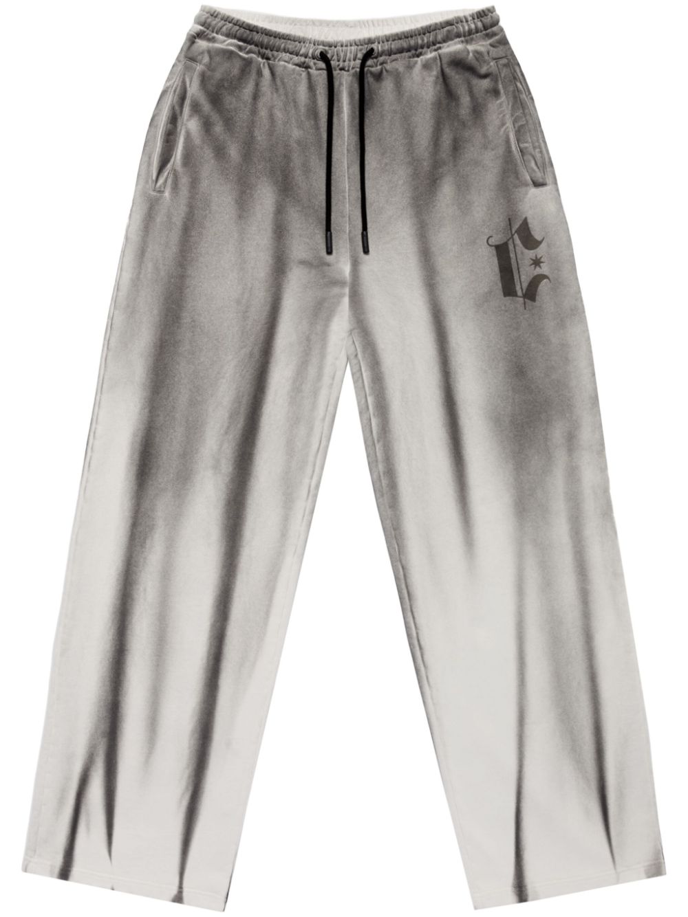 spray-effect track pants