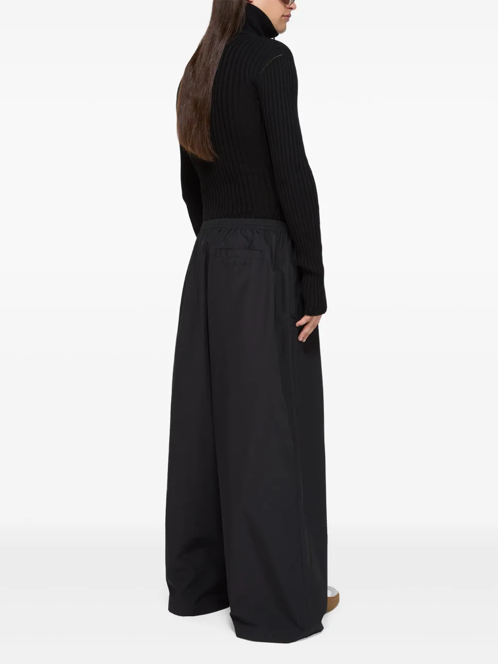 Acne Studios Broek met wijde pijpen Zwart