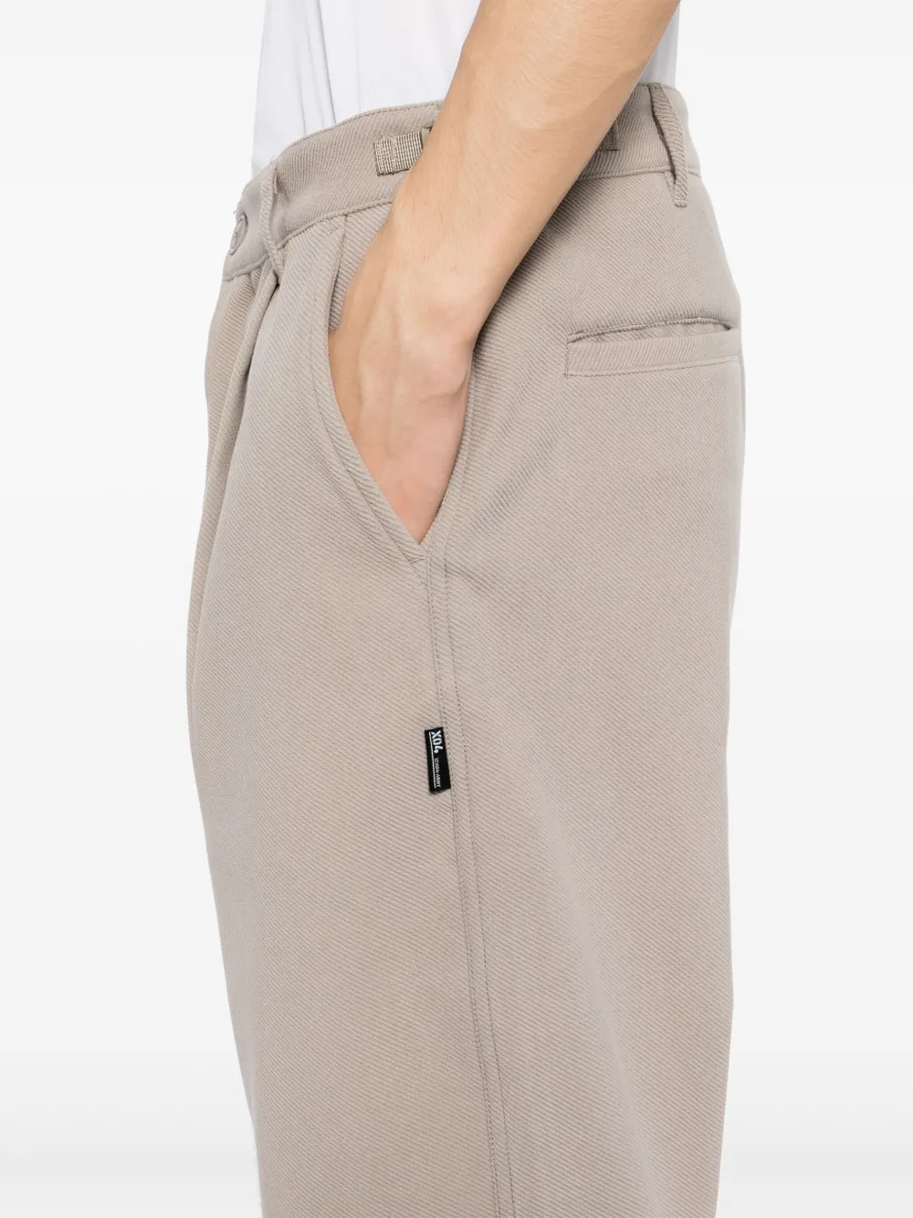 izzue Broek met ceintuur Beige