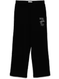 izzue graphic-print track pants - Black