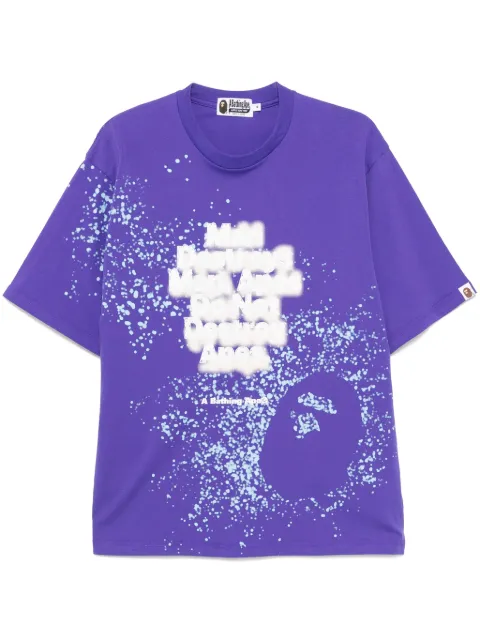 A BATHING APE® spray-print slogan T-shirt