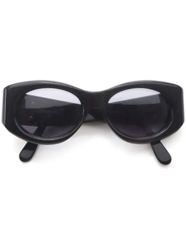 CHANEL Pre Owned 1990s oval frame sunglasses women Acetate One Size Black