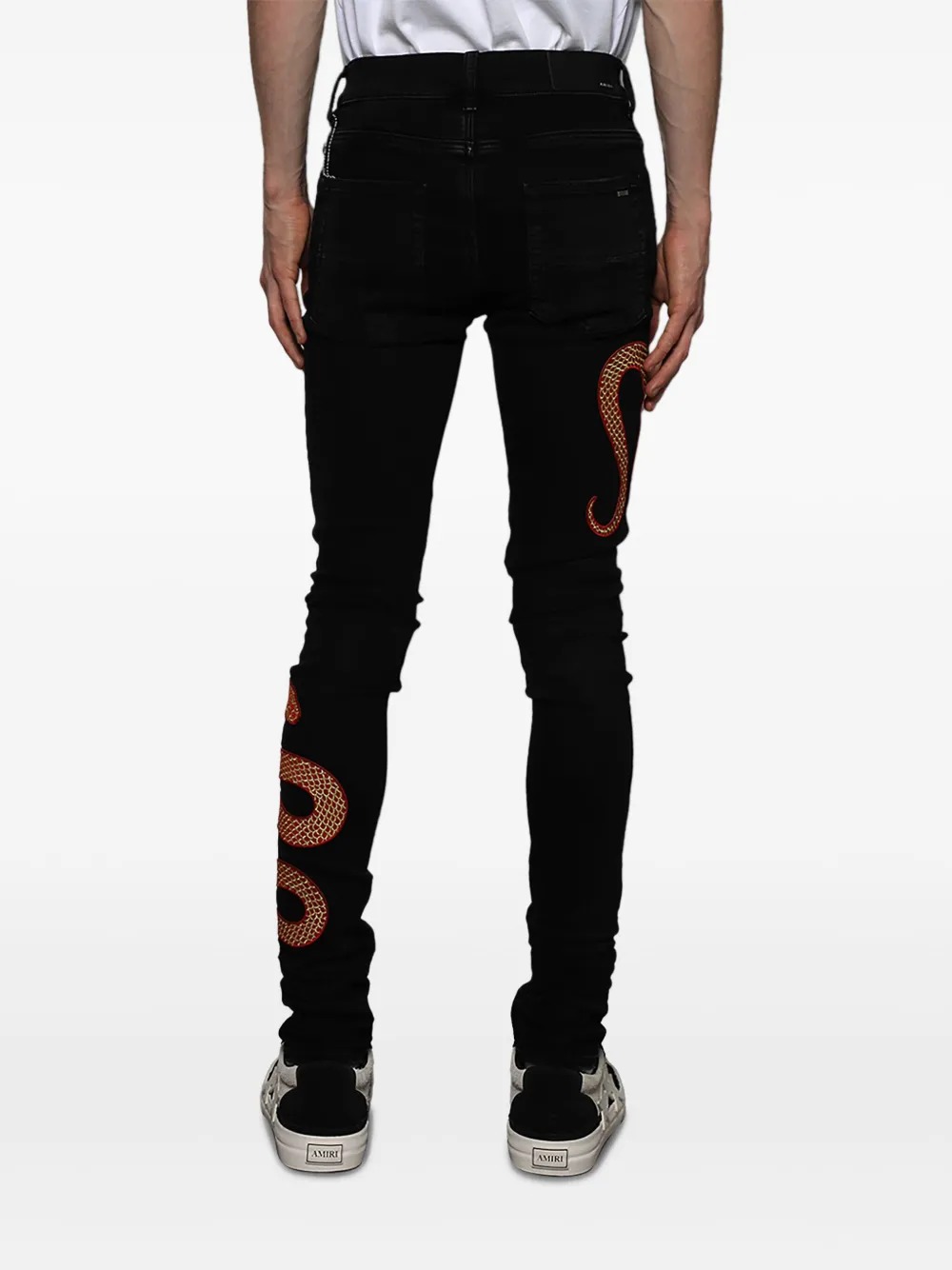 AMIRI SNAKE SKINNY JEANS